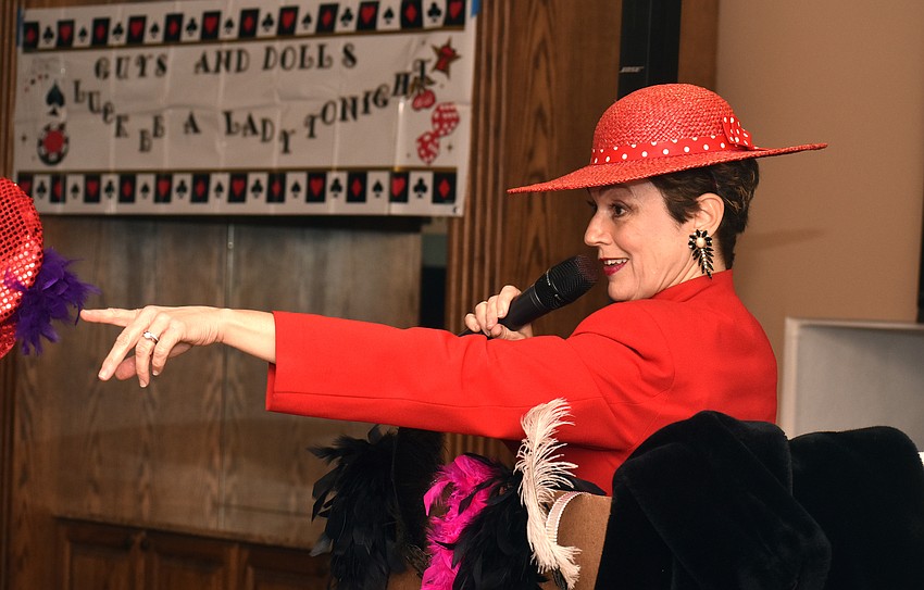 Connie Scardelli points to crowd members as she sings songs from “Guys and Dolls.”