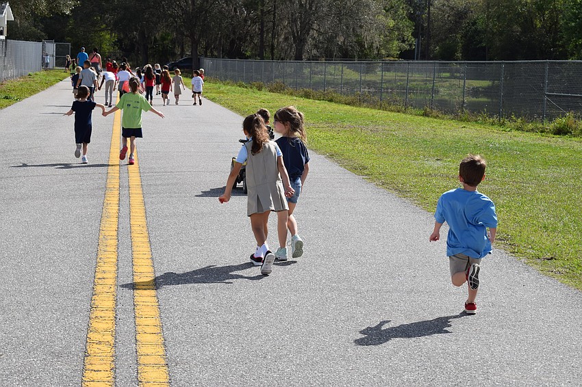 Just before students were allowed to start running on the field, some kindergartners couldn't wait.
