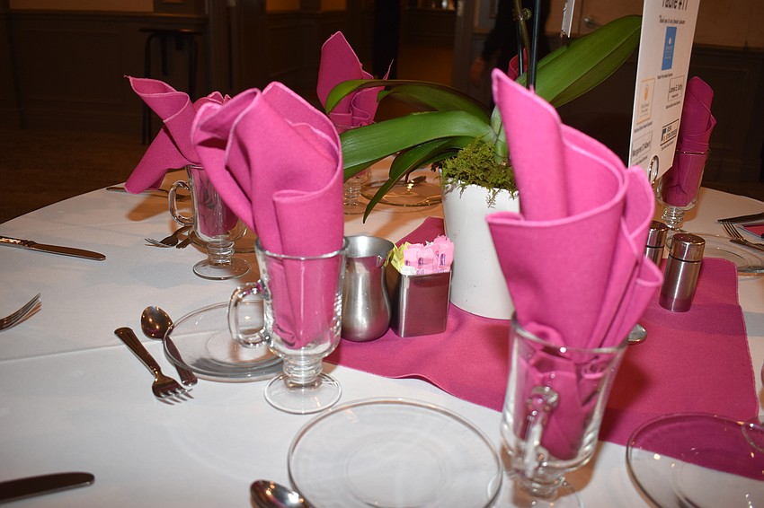The pink napkins matched the pink accent colors around the room.
