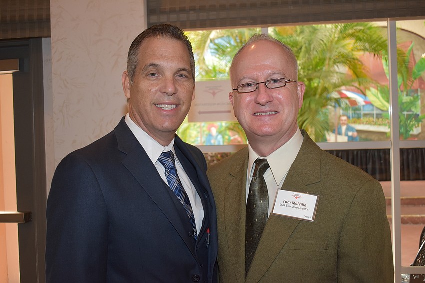 Literacy Council of Sarasota Board President Vincente Medine with LCS Executive Director Tom Melville
