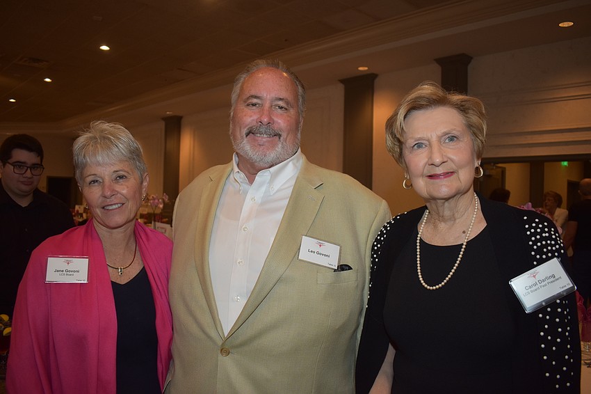 Board member Jane Govoni, Leo Govoni and board member Carol Darling