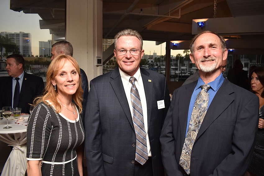 Kathleen Croteau, Board Chairman David Karins and C.J. Dupre