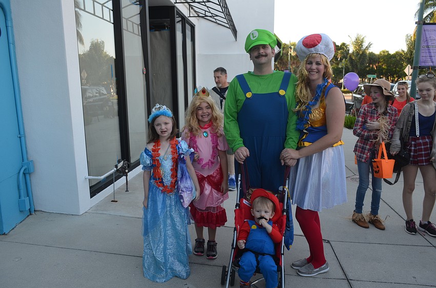 Seline Schalk, 7, as Cinderella, Alexis LeVasseur, 7, as Princess Peach, Chris Budelman, as Luigi, Monique Schalk, as Toad, and Cooper Budelman, 1, as Mario