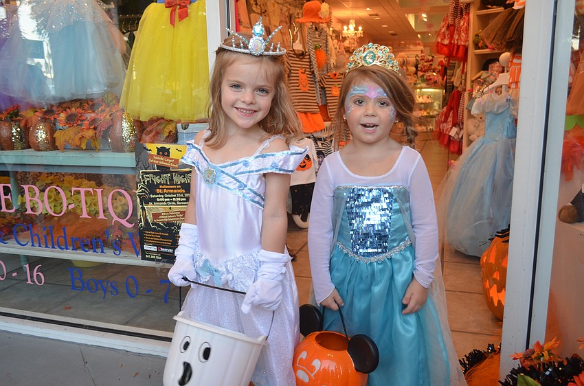 Chloe Wozney, 4, and Skylar Caldwell, 4, as princesses