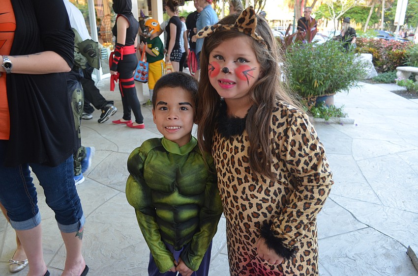 Nicoliy Ibarra, 4, as the Incredible Hulk, with sister, Luana, 6, as a leopard