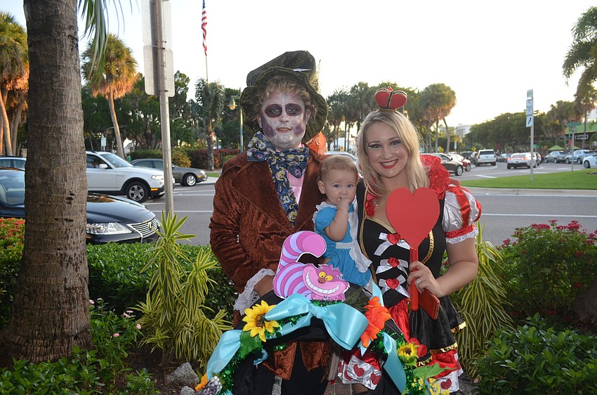 Justin Schrock, with Anniston, 11 months, and Katie, as characters from Alice in Wonderland.