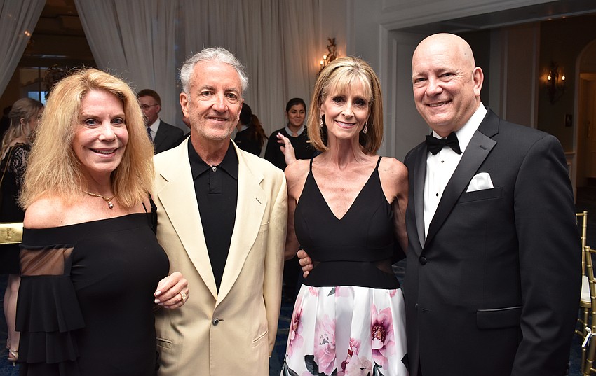 Lisa and Dr. Charles Loewe with Judith and Chairman Steve Altier