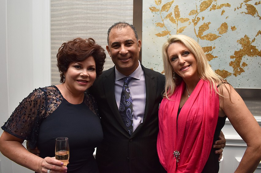 Carrie and Aric Lewis with Missy Weishaar