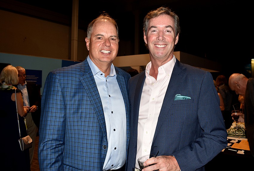 Brian Maddox and event emcee Ray Collins