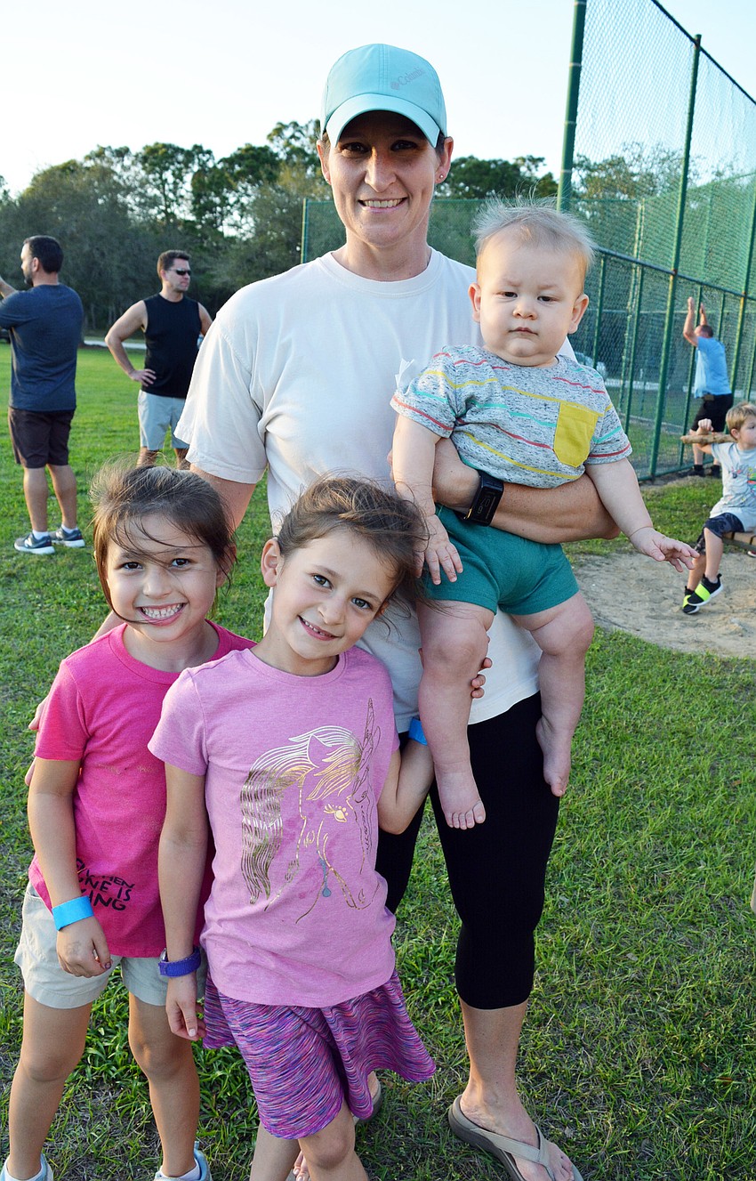 Amy Bower has fun with friend Caroline Martin and her children Vivian and Anderson Bower.