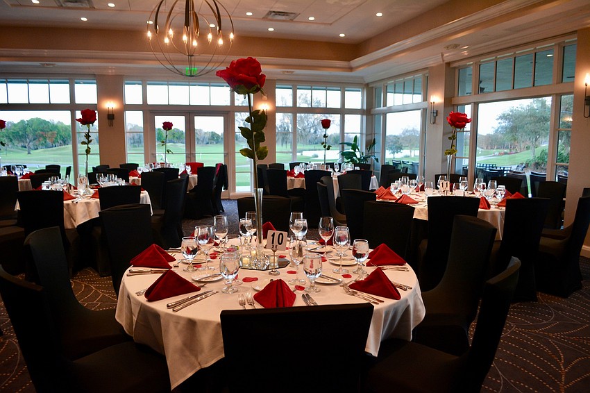 Dinner tables were adorned with rose petals and large rose centerpieces.