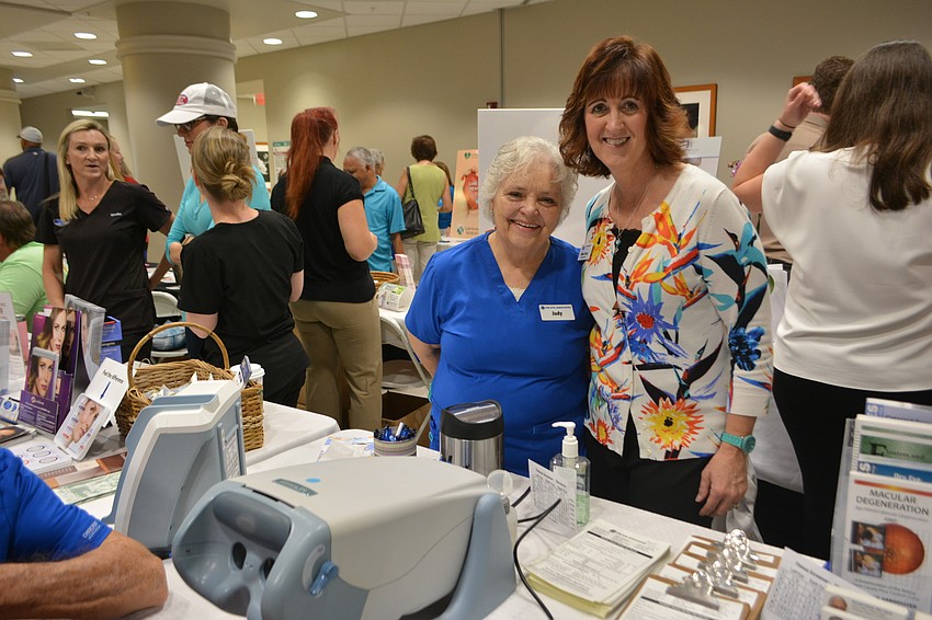 Technician Judy Sweet and Community Relations Manager Aimee Garay were at the Expo to represent Eye Associates.