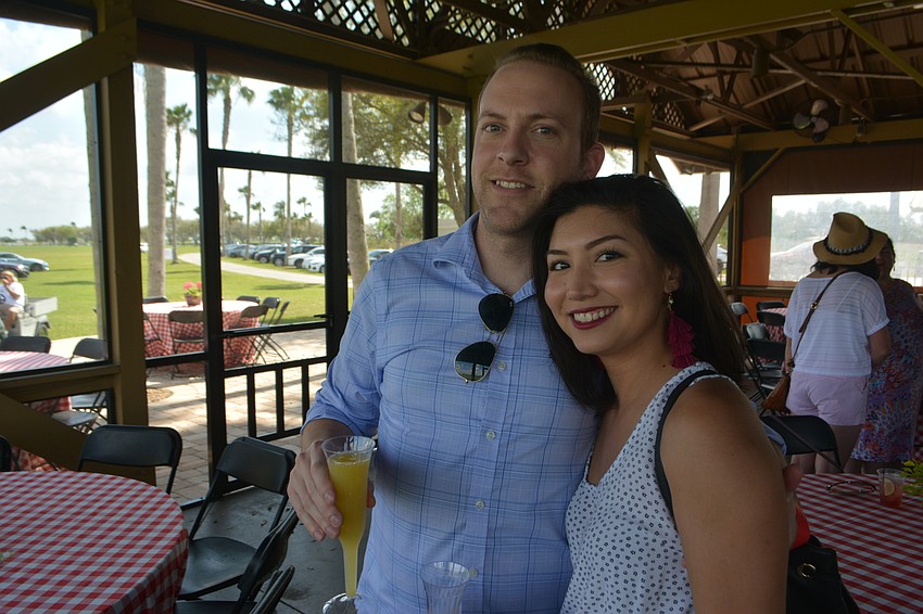 Don and Moneika Okawa, who just got engaged, enjoy the day at the Observer Cup.