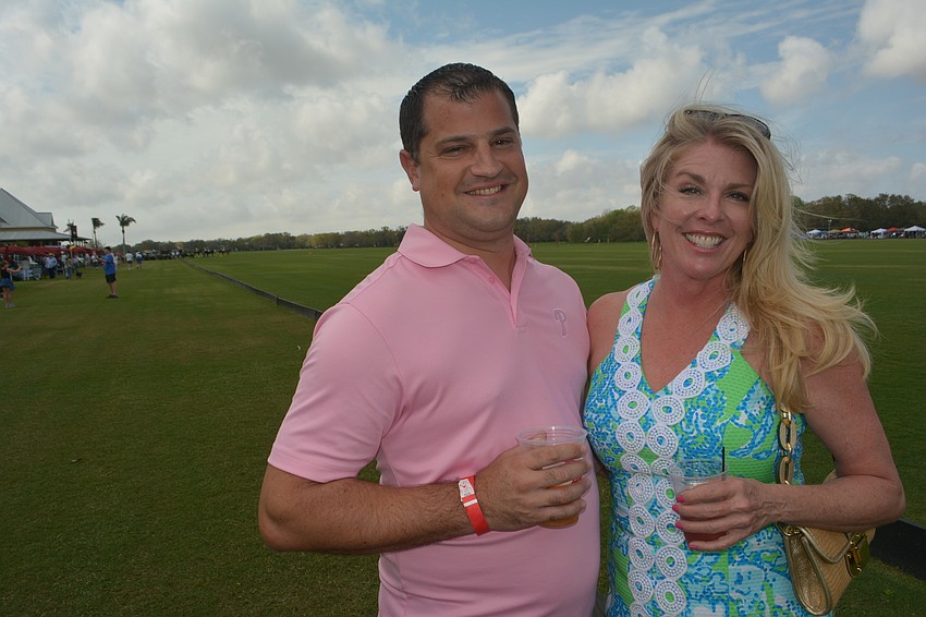 Lakewood Ranch Community Activities' Keith Pandeloglou visits with Blake Medical Center's Lisa Kirkland.