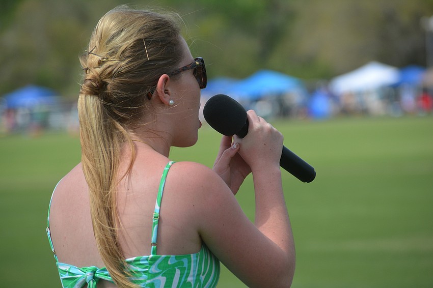 Sarasota's Kaki France belts out the National Anthem.