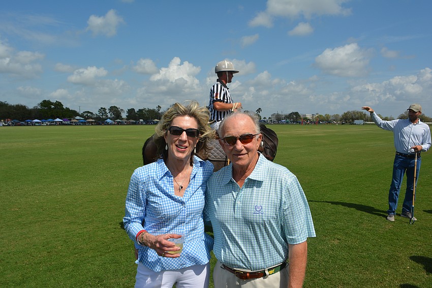 Sally Livingston, the membership director at Rosedale Golf & Country Club, and Patrick Livingston of National Golf Schools, check out the polo field before the match.