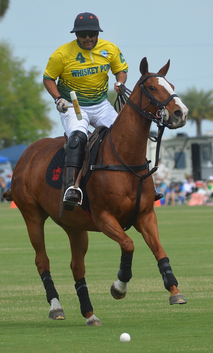 Whiskey Pond's Guillermo Aguero chases down the ball.