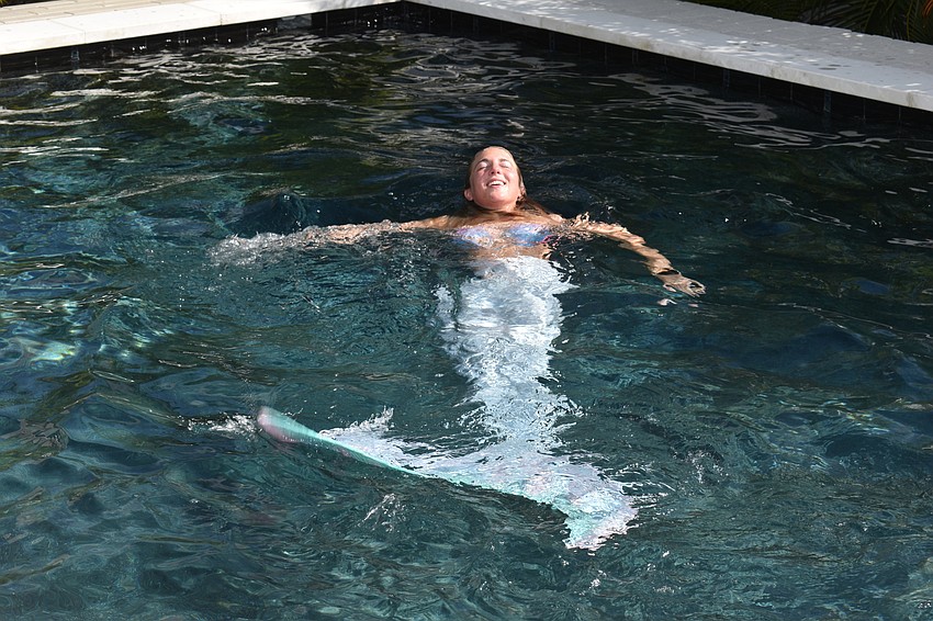 Elle the Mermaid swam for attendees of the Junior League Tour of Homes.