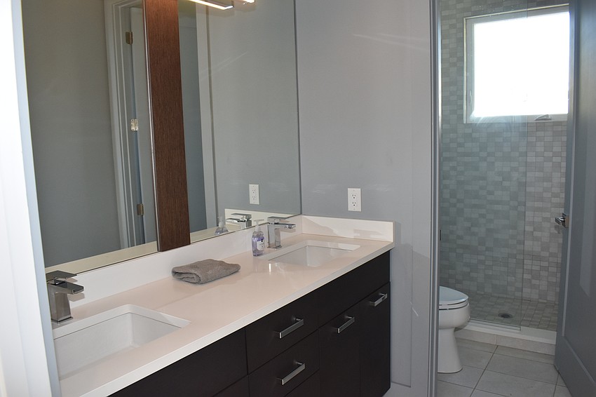 The bathroom of the house on Alderman Street is one of the more modern designs.