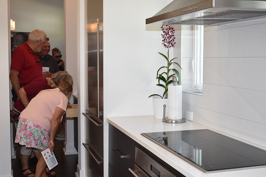 Guests were intrigued by the sleek design of the kitchen in the house on Alderman Street.