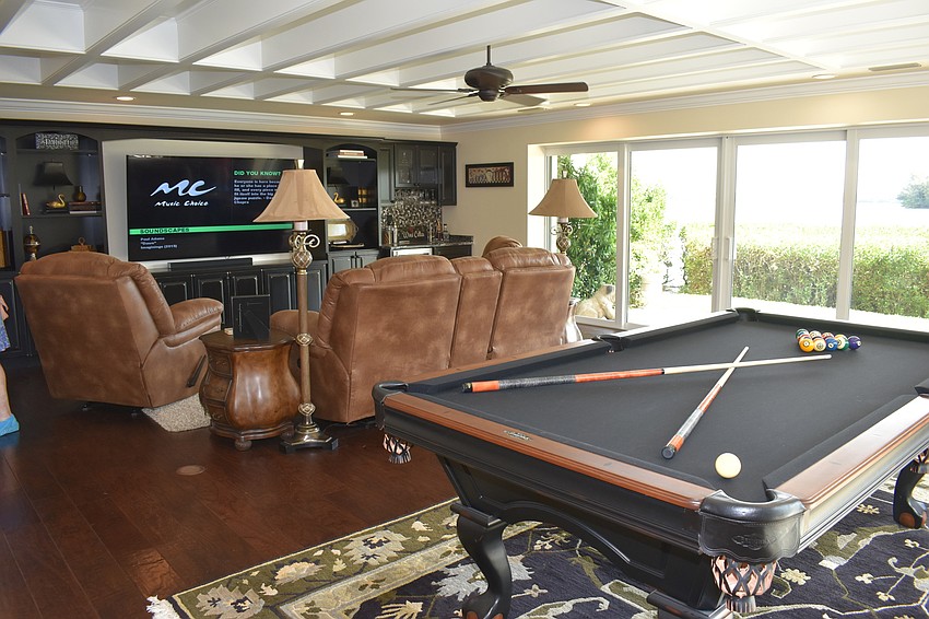 The house on Siesta Key Circle had amenities like a pool table and a boat dock.