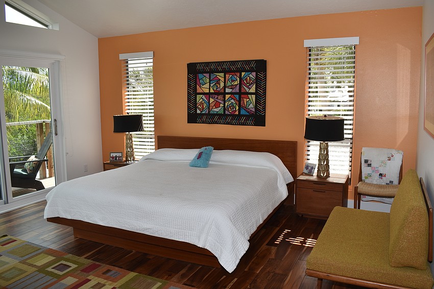 The house on Siesta Cove Drive had an interesting color scheme, with most of its walls painted green or orange, like in the master bedroom.