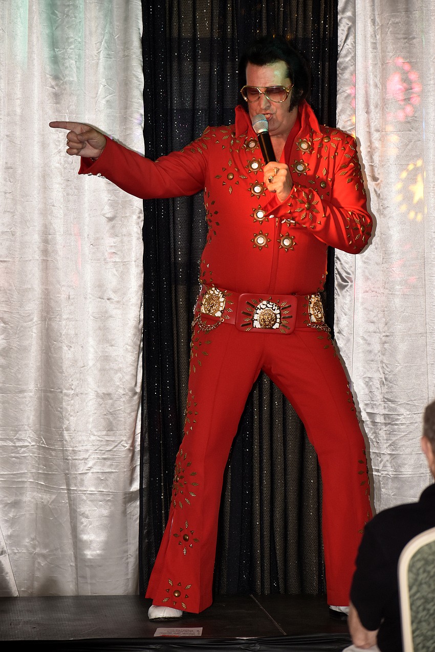 Chris Olsen performs as Elvis for 100 Spanish Main residents.
