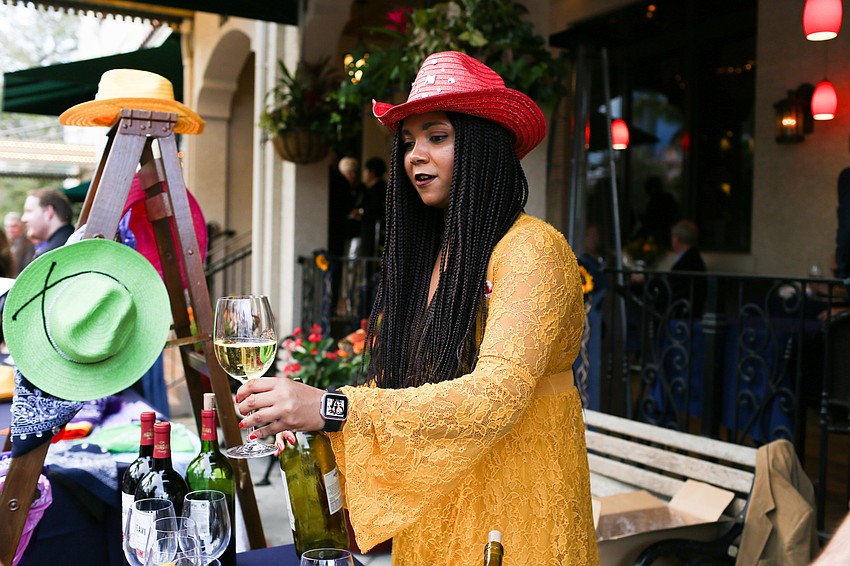 Liv Wilson served drinks to guests.