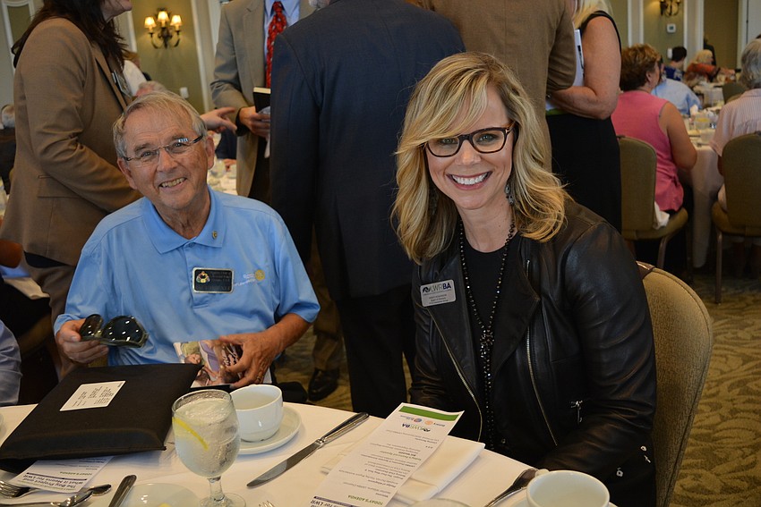Rotary Club's Paul Hoenle meets Business Alliance member Kristi Hoskinson, of FCCI. Hoskinson said the luncheon is a great way for businesses and organizations to connect and help each other.