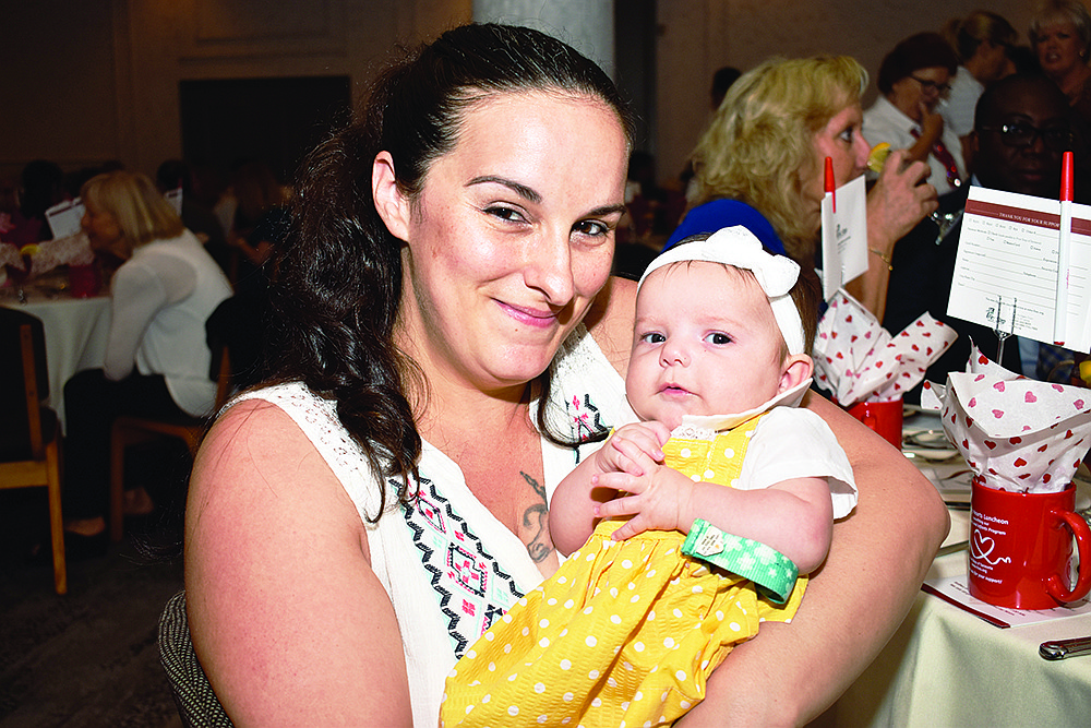 Christina Krug and her daughter, Jovieana, at the 2019 Caring Hearts Luncheon on Feb. 20 at Michaelâ€™s On East.