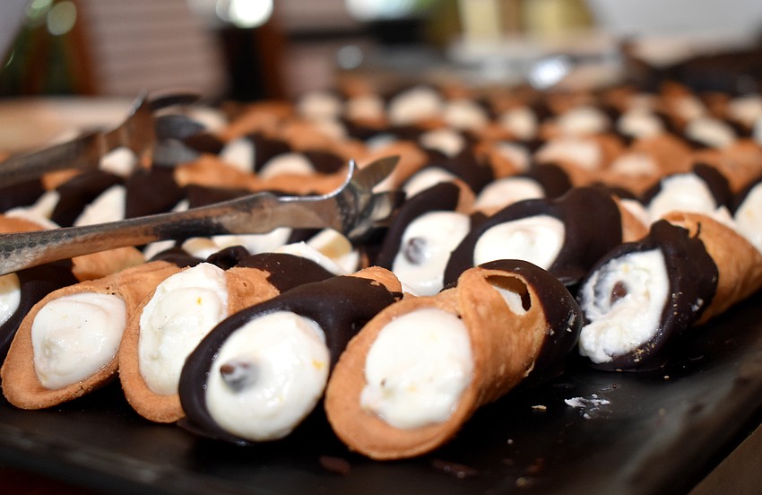 Cannolis and tiramisu were served for dessert.