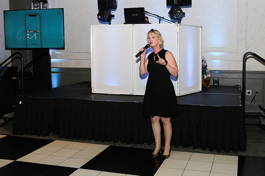 Veronica Brady tells guests how the app will benefit the nonprofit community.