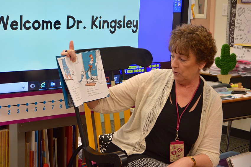 Laura Kingsley, assistant superintendent and chief academic officer of Sarasota County Schools, read 