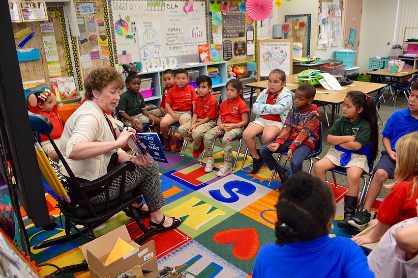 Laura Kingsley, assistant superintendent and chief academic officer of Sarasota County Schools, read 