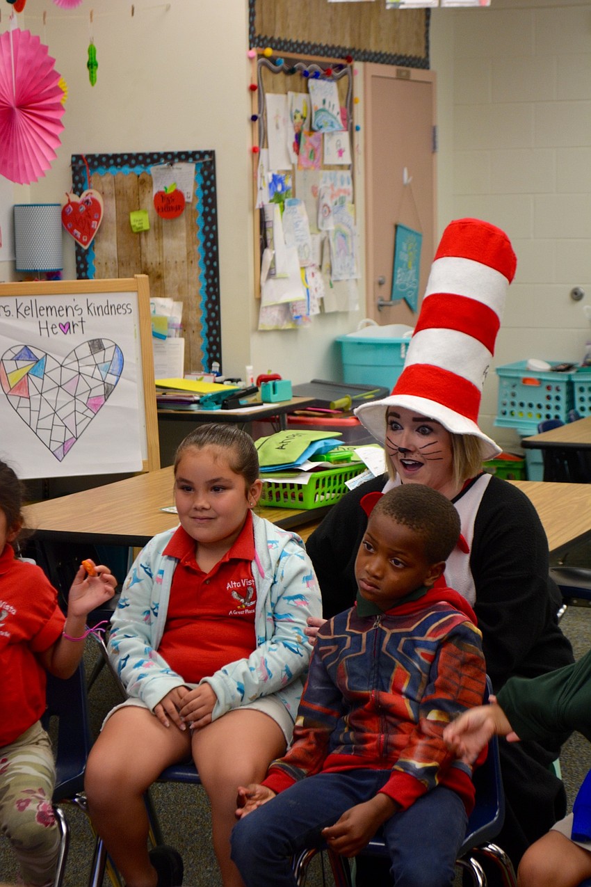 Alex Kellemen, teacher of the kindergarten class, dressed as the Cat in the Hat for the special day of reading.