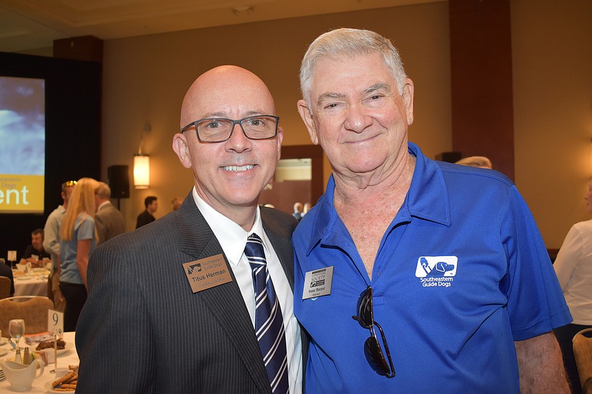 Southeastern Guide Dogs CEO Titus Herman and Isaac Barpal