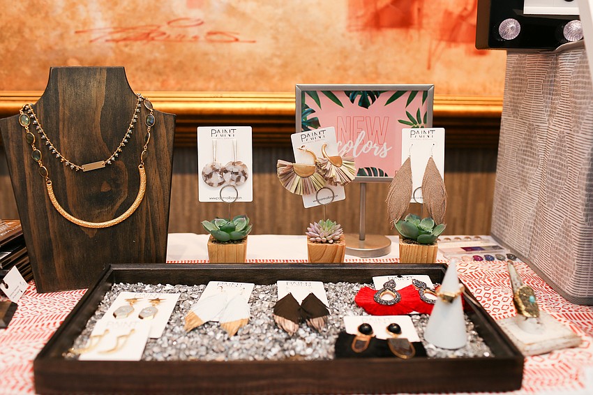 Paint Nail Bar set up a station to paint paw prints on guests' nails.