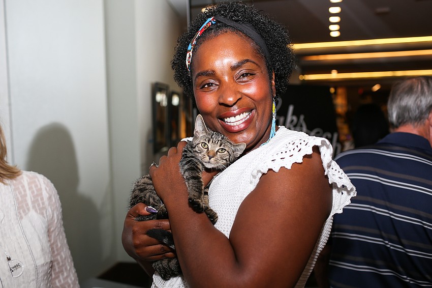 Tomeika Hunter Koski holds her new kitten.