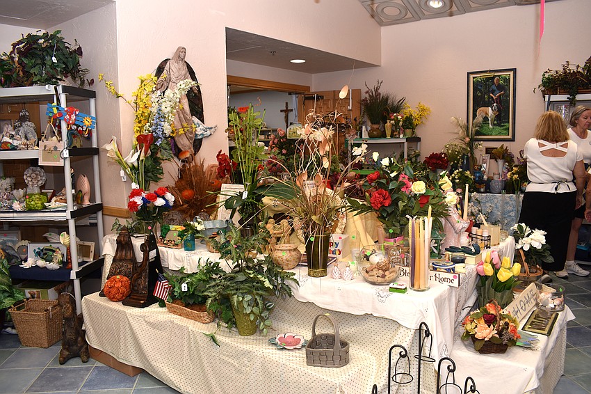 Plants and other decor were some of the first items customers saw upon entering the sale.
