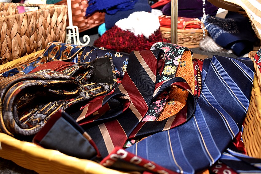 Ties sat near purses and belts during the sale.