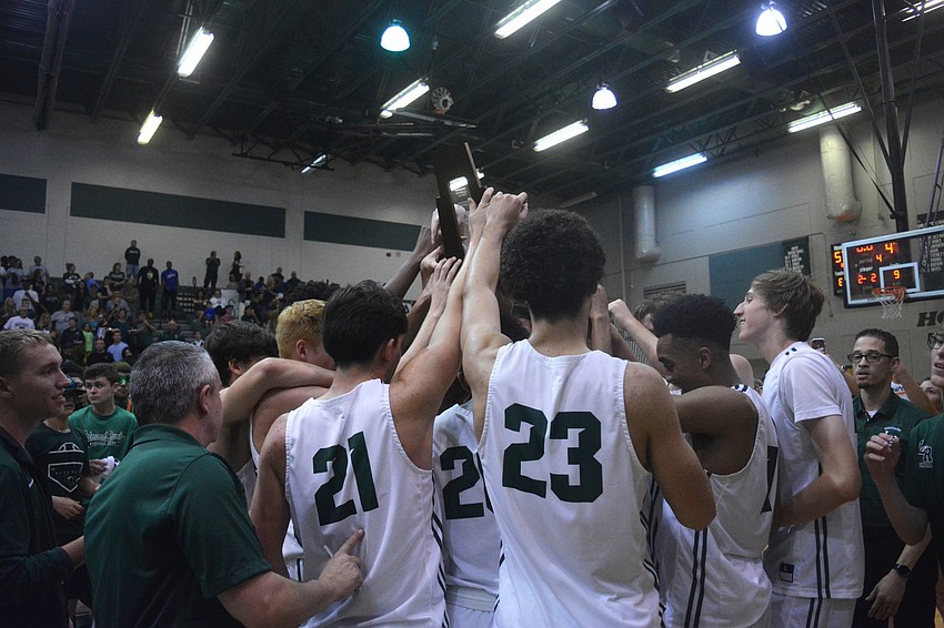 The Mustangs celebrate their regional final win against East Lake High.