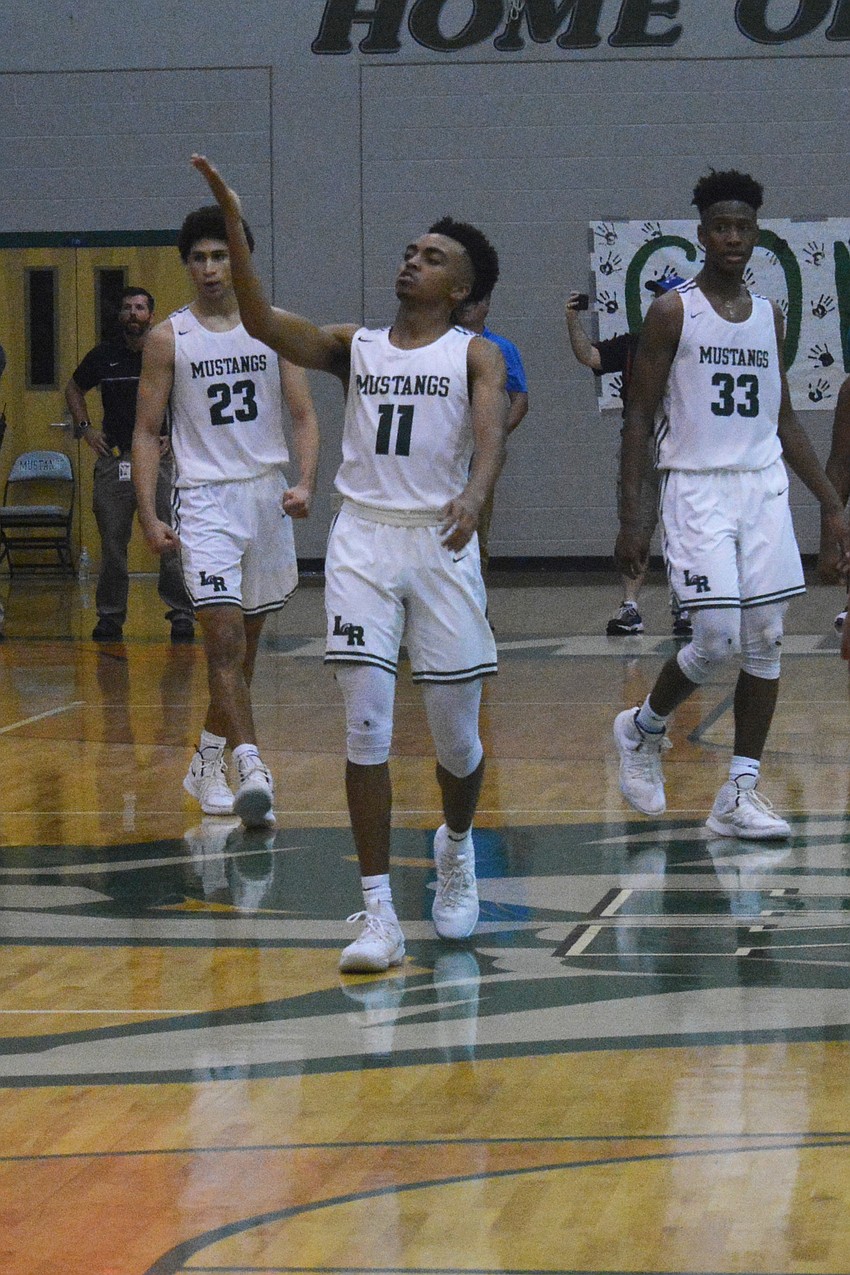Lakewood Ranch High senior guard Lantz Barton blows a goodbye kiss to the East Lake High cheering section. Barton finished with four points, two assists and a rebound.