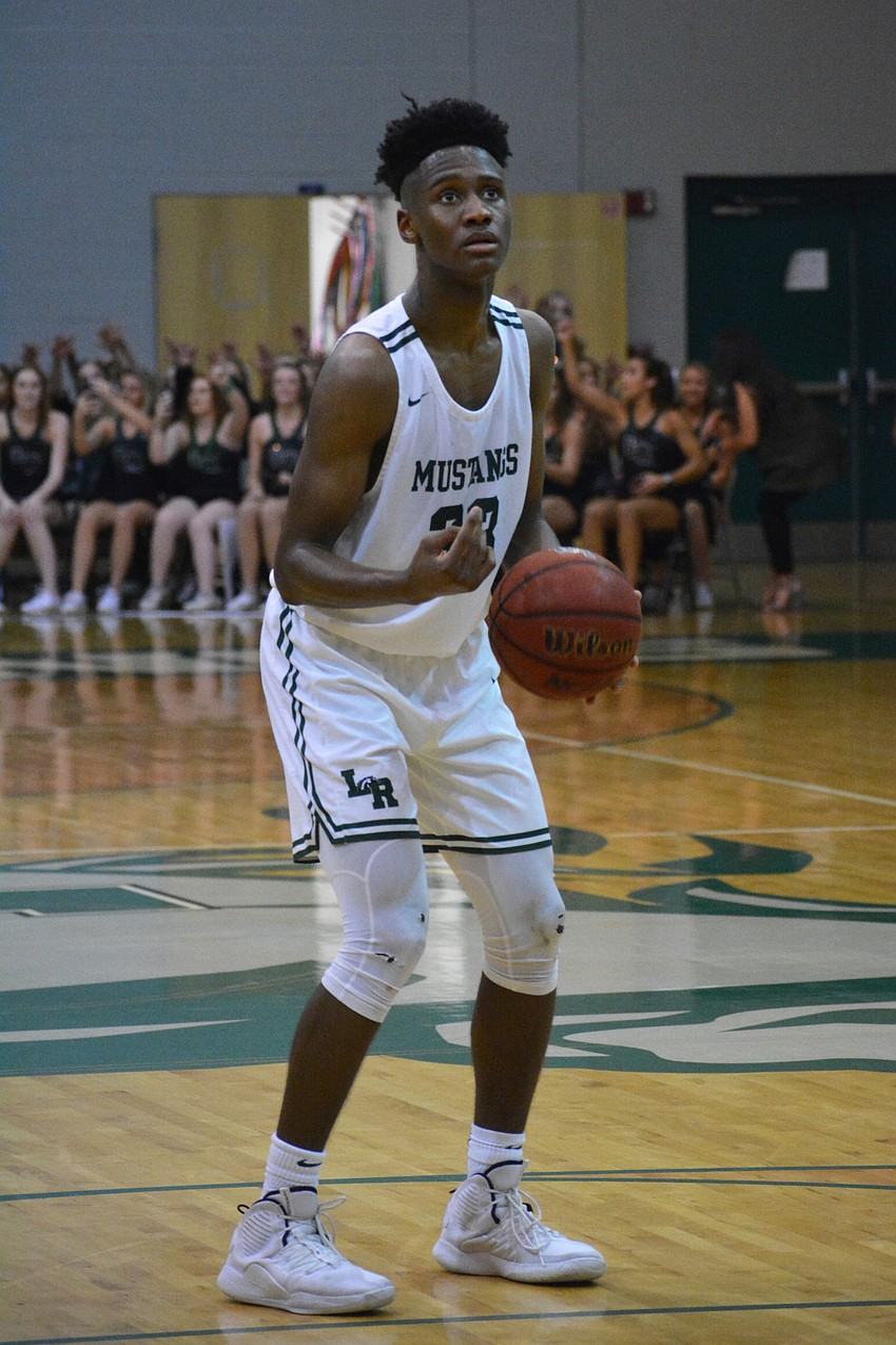 Lakewood Ranch High senior Josh Young prepares to shoot free throws late in the game against East Lake High. Young finished with 12 points and six rebounds.