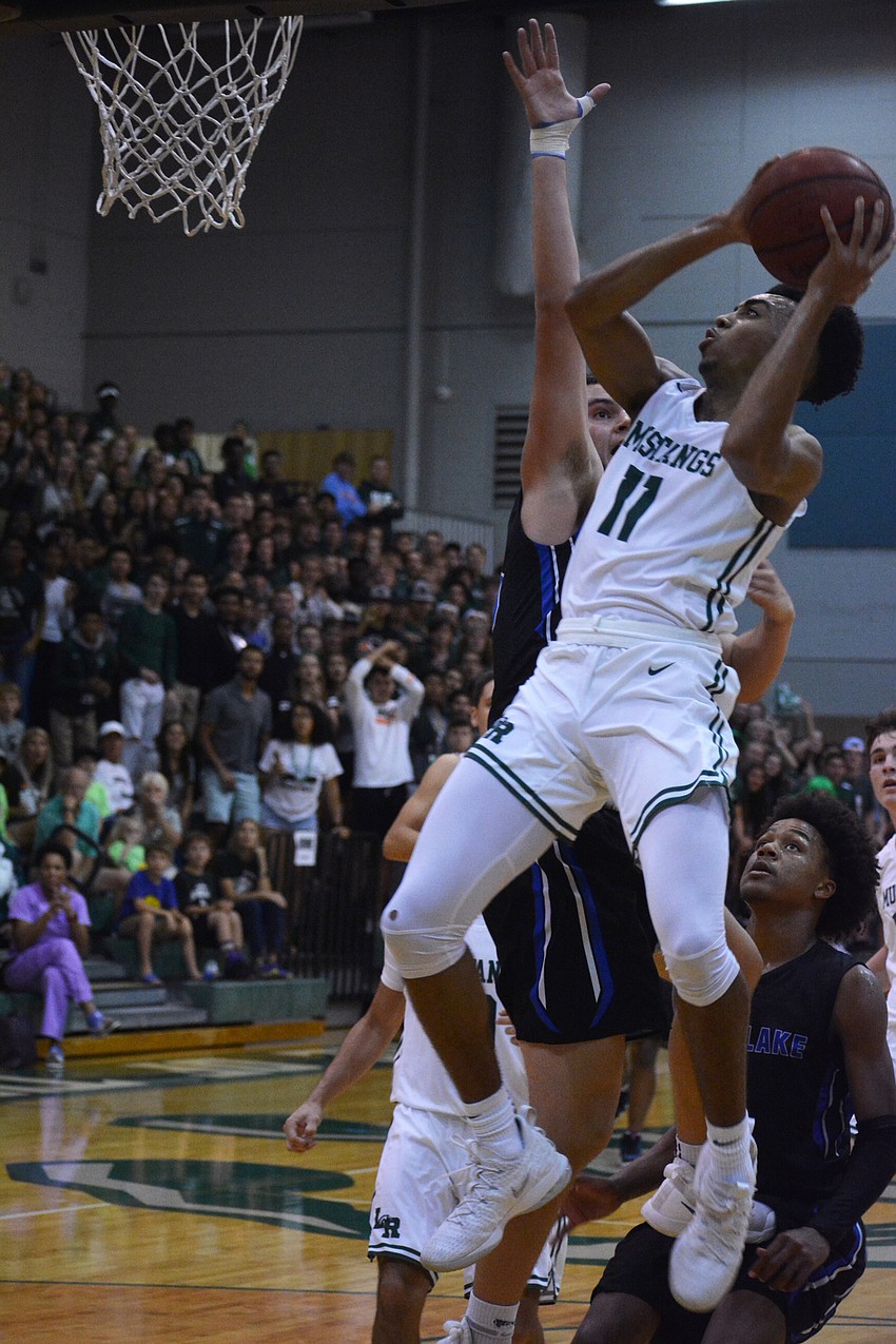 Lakewood Ranch senior guard Lantz Barton floats for a baseline layup.