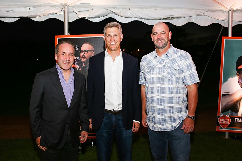 Executive VP and COO of the Orioles John Angelos, General Manager Mike Elias and Manager Brandon Hyde