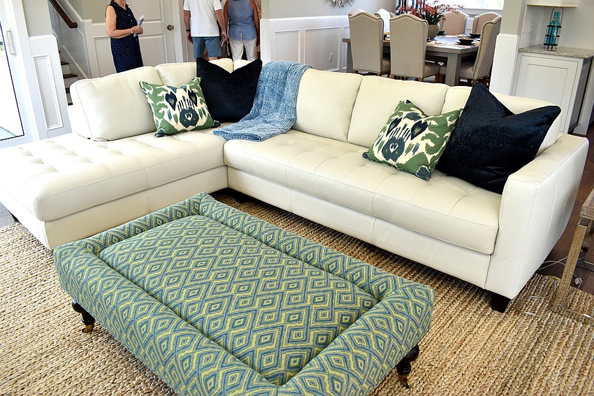 Coastal colors accent a newly constructed home.