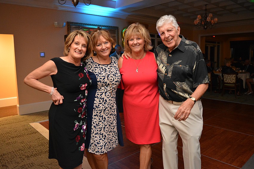 Karen Wilkes, Eileen Barchi and Joyce and Jim Chaffee pose for a picture before a short celebration announcement.