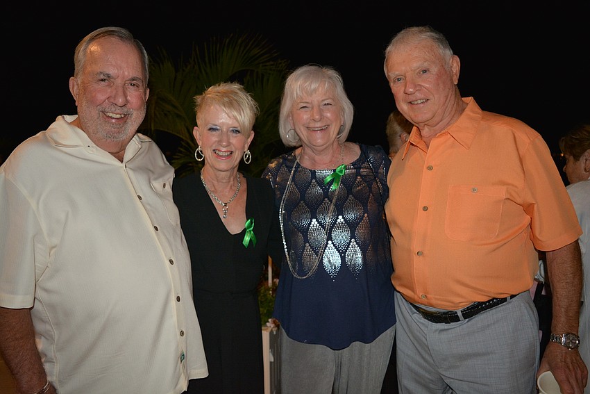 David Wilson, Barb Dennis, Linda Wilson and Keith McMillan go outside for the fireworks.