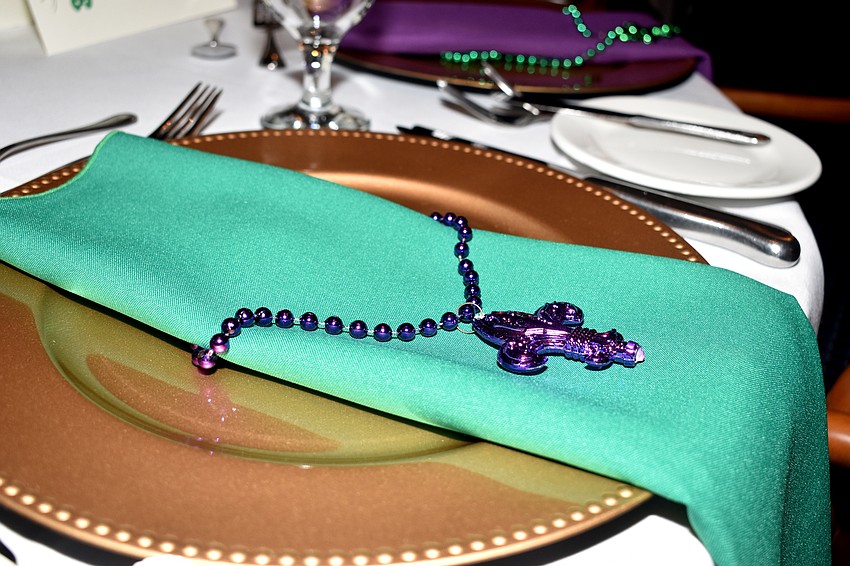 Green, purple and gold decorated the dining room.