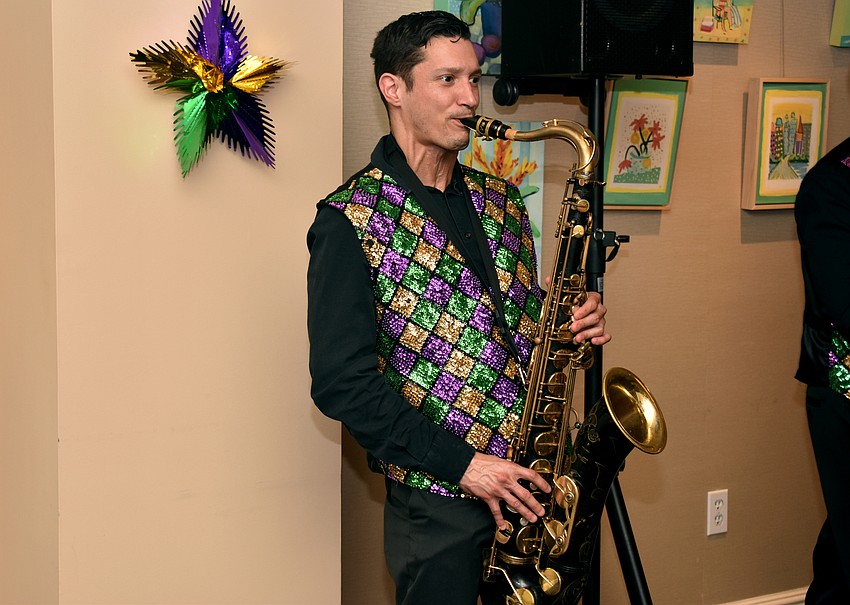 “Jammin’ Jambalaya” performed as guests arrived.